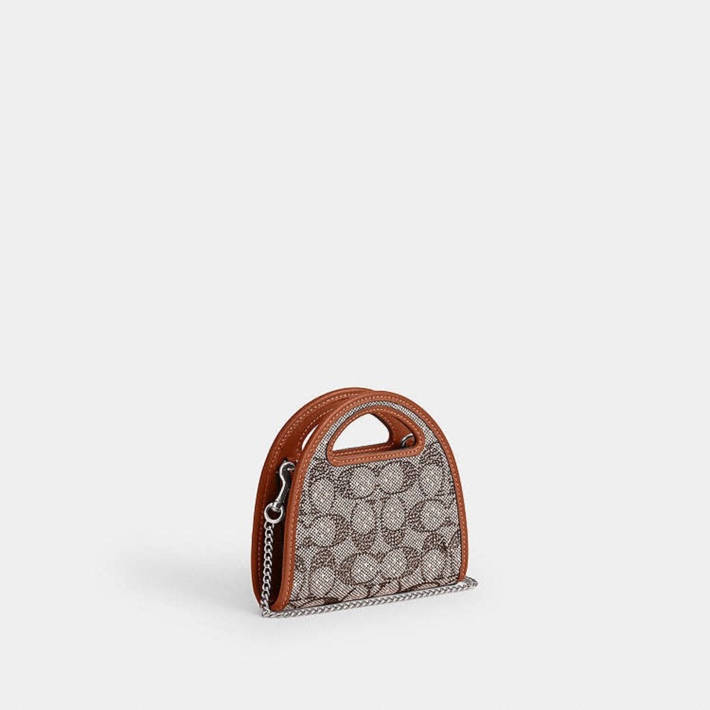 Top Handle Card Case
In Crystal Signature Jacquard NWT
Coach - Picture 2 of 5